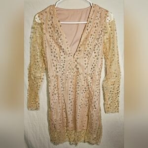 Cocktail dress, it's for someone petite it's pastel pink with gold glitter